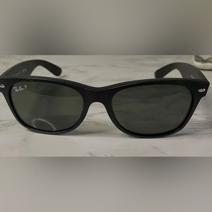 Brand new Ray Ban Polarized 2132 Wayfarers. Never worn